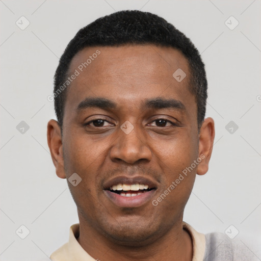 Joyful black young-adult male with short  black hair and brown eyes