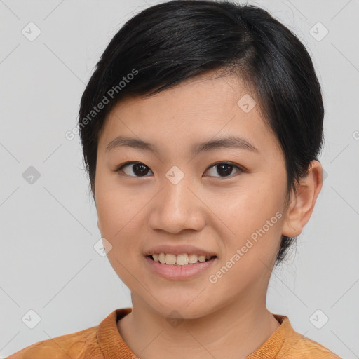 Joyful asian young-adult female with medium  black hair and brown eyes