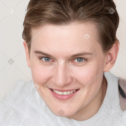 Joyful white young-adult female with short  brown hair and grey eyes