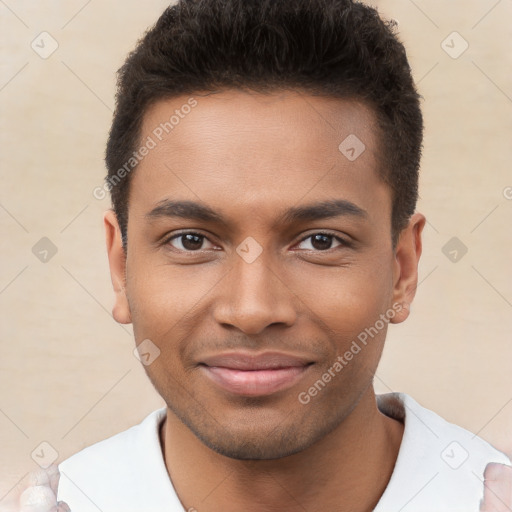 Joyful black young-adult male with short  brown hair and brown eyes