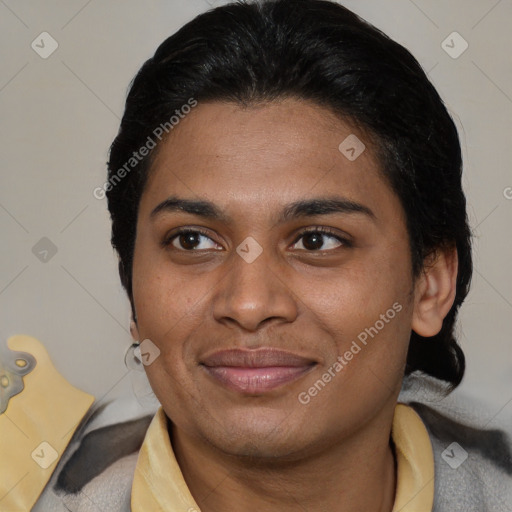 Joyful latino young-adult female with short  brown hair and brown eyes