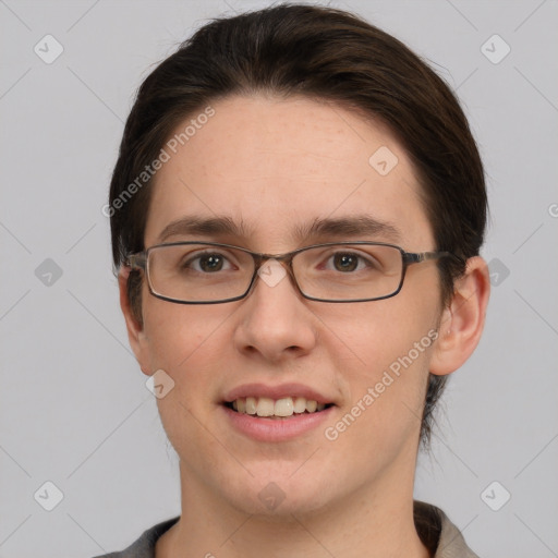 Joyful white young-adult female with short  brown hair and grey eyes