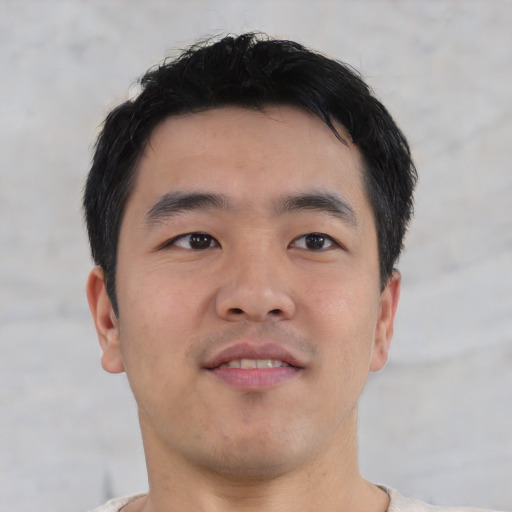 Neutral asian young-adult male with short  black hair and brown eyes