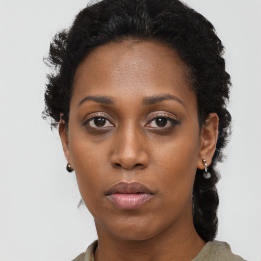 Neutral black young-adult female with long  black hair and brown eyes