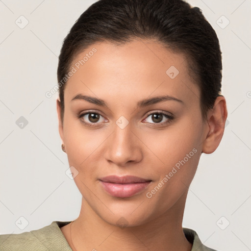 Joyful latino young-adult female with short  brown hair and brown eyes