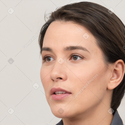 Neutral white young-adult female with medium  brown hair and brown eyes