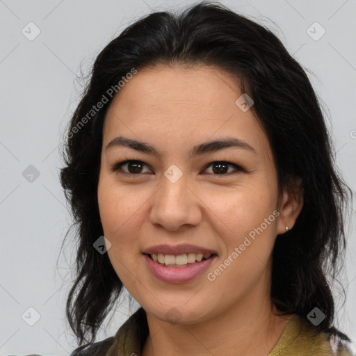 Joyful latino young-adult female with medium  brown hair and brown eyes