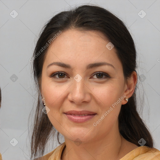 Joyful white adult female with medium  brown hair and brown eyes