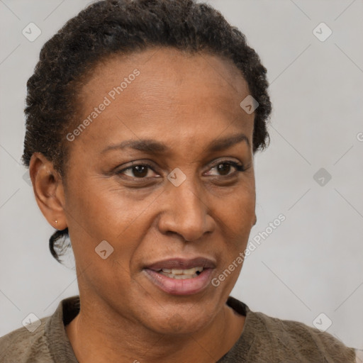 Joyful latino adult female with short  brown hair and brown eyes