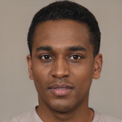 Neutral black young-adult male with short  black hair and brown eyes