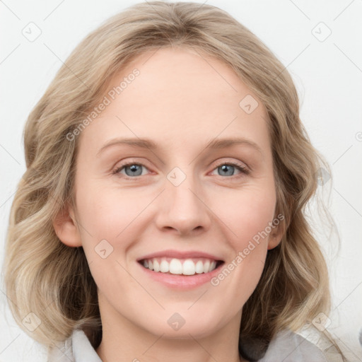 Joyful white young-adult female with medium  brown hair and blue eyes