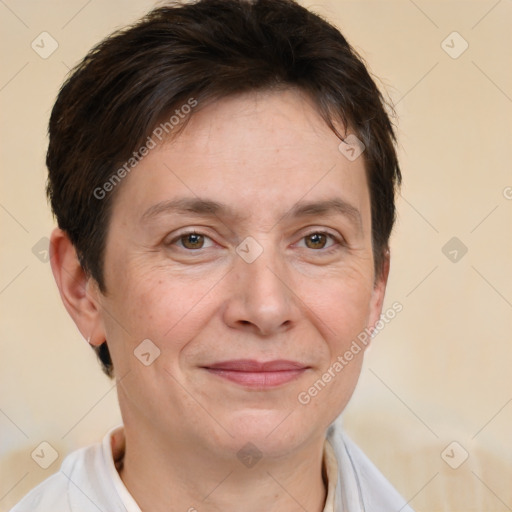 Joyful white adult female with short  brown hair and brown eyes