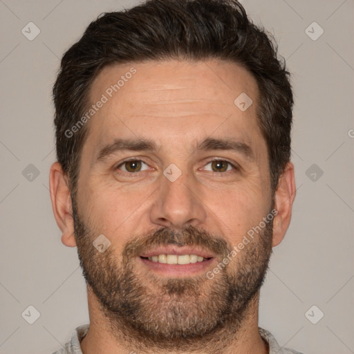 Joyful white adult male with short  brown hair and brown eyes