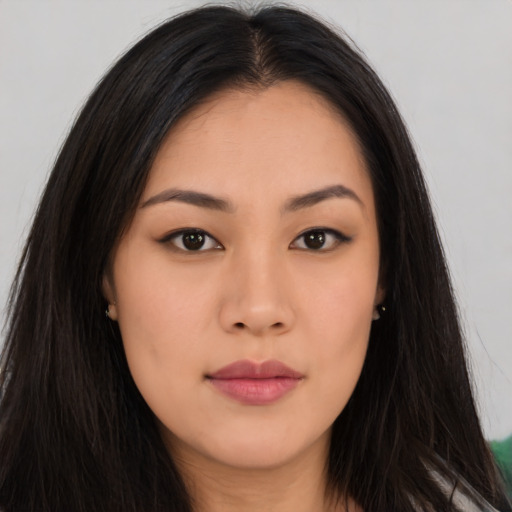 Neutral asian young-adult female with long  brown hair and brown eyes