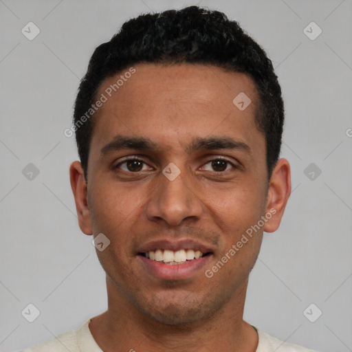 Joyful white young-adult male with short  black hair and brown eyes