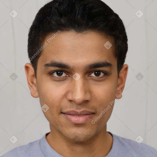 Joyful latino young-adult male with short  brown hair and brown eyes