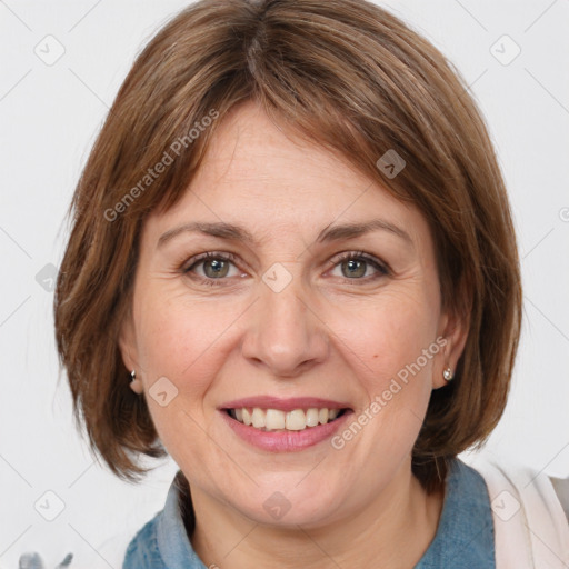 Joyful white adult female with medium  brown hair and grey eyes