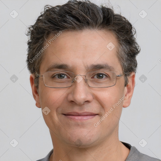 Joyful white adult male with short  brown hair and grey eyes