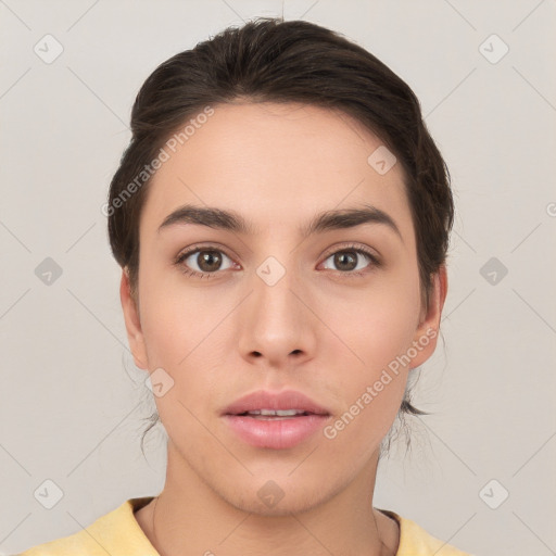 Neutral white young-adult female with short  brown hair and brown eyes