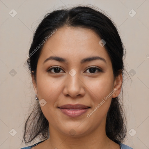 Joyful latino young-adult female with medium  brown hair and brown eyes