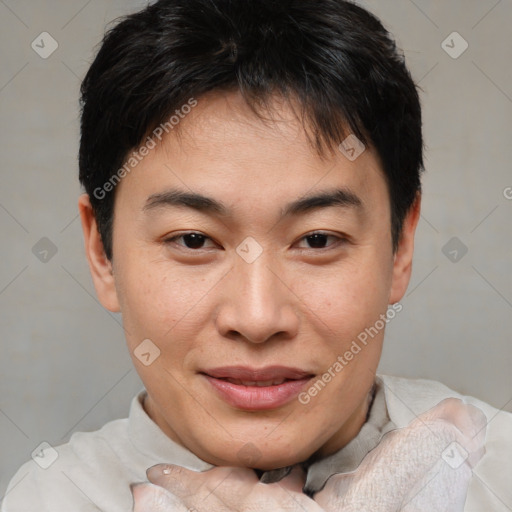 Joyful asian young-adult male with short  brown hair and brown eyes