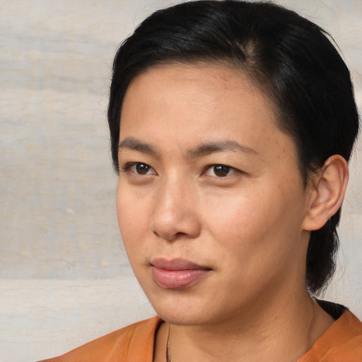 Neutral asian young-adult female with short  black hair and brown eyes