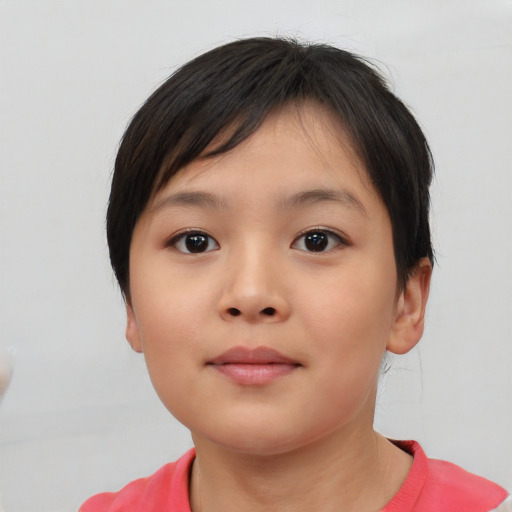Neutral asian child female with short  brown hair and brown eyes