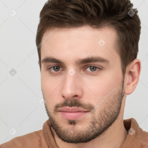 Neutral white young-adult male with short  brown hair and brown eyes