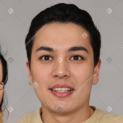 Joyful asian young-adult male with short  black hair and brown eyes