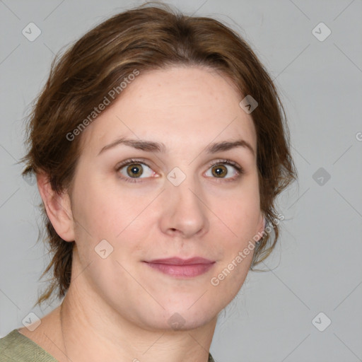 Joyful white young-adult female with medium  brown hair and green eyes