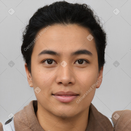 Joyful asian young-adult male with short  brown hair and brown eyes