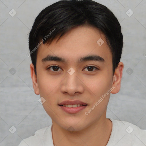 Joyful asian young-adult male with short  brown hair and brown eyes