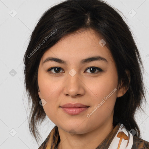 Joyful latino young-adult female with medium  brown hair and brown eyes