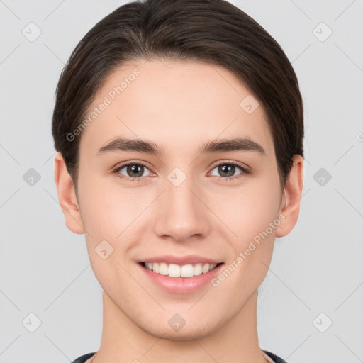 Joyful white young-adult female with short  brown hair and brown eyes