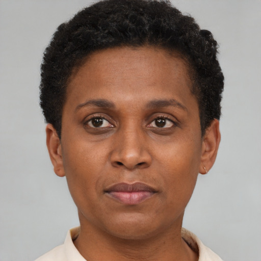 Neutral black young-adult female with short  brown hair and brown eyes