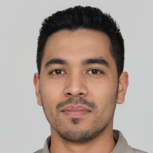 Neutral latino young-adult male with short  black hair and brown eyes