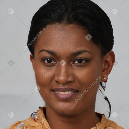 Joyful latino young-adult female with short  brown hair and brown eyes