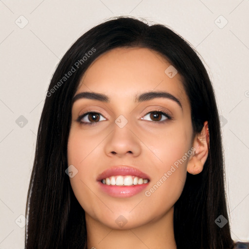 Joyful latino young-adult female with long  black hair and brown eyes