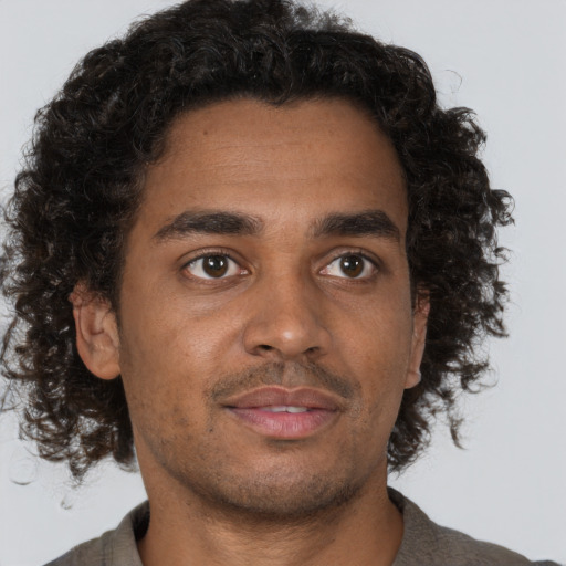 Neutral black young-adult male with short  brown hair and brown eyes