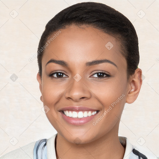 Joyful latino young-adult female with short  brown hair and brown eyes