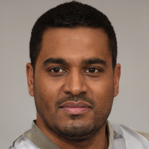 Neutral black young-adult male with short  brown hair and brown eyes
