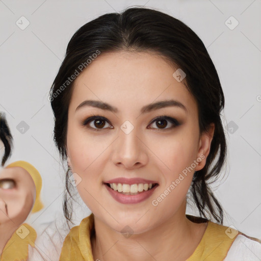 Joyful latino young-adult female with medium  brown hair and brown eyes