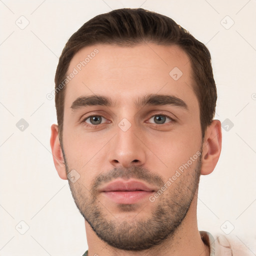 Neutral white young-adult male with short  brown hair and brown eyes