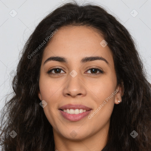 Joyful latino young-adult female with long  brown hair and brown eyes