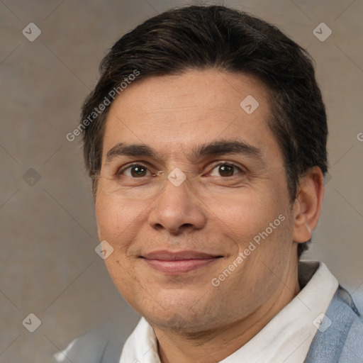 Joyful white adult male with short  brown hair and brown eyes