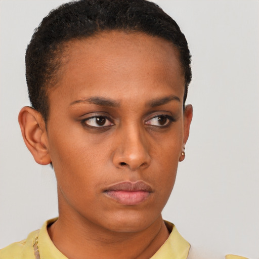 Neutral latino young-adult female with short  brown hair and brown eyes