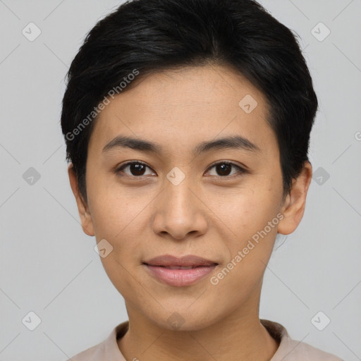 Joyful asian young-adult female with short  brown hair and brown eyes