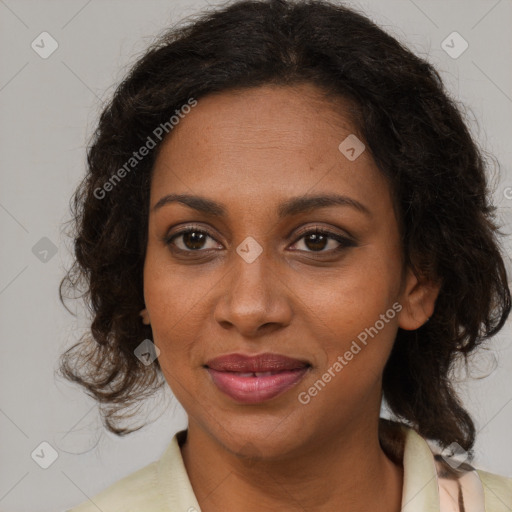 Joyful black young-adult female with medium  brown hair and brown eyes