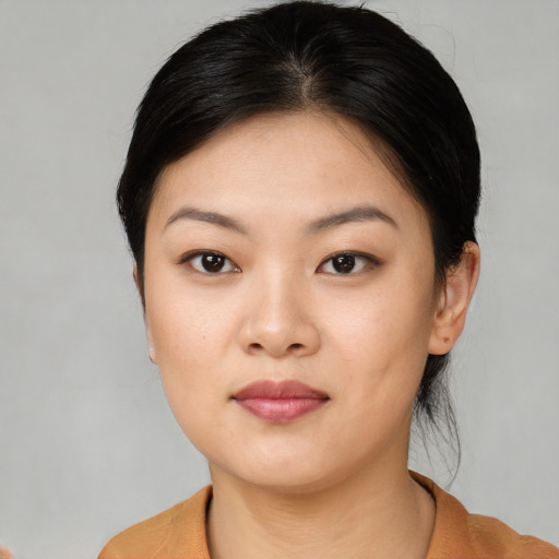 Neutral asian young-adult female with short  brown hair and brown eyes
