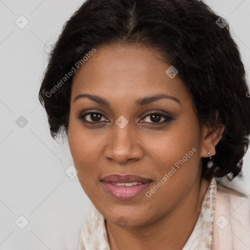 Joyful black young-adult female with medium  brown hair and brown eyes